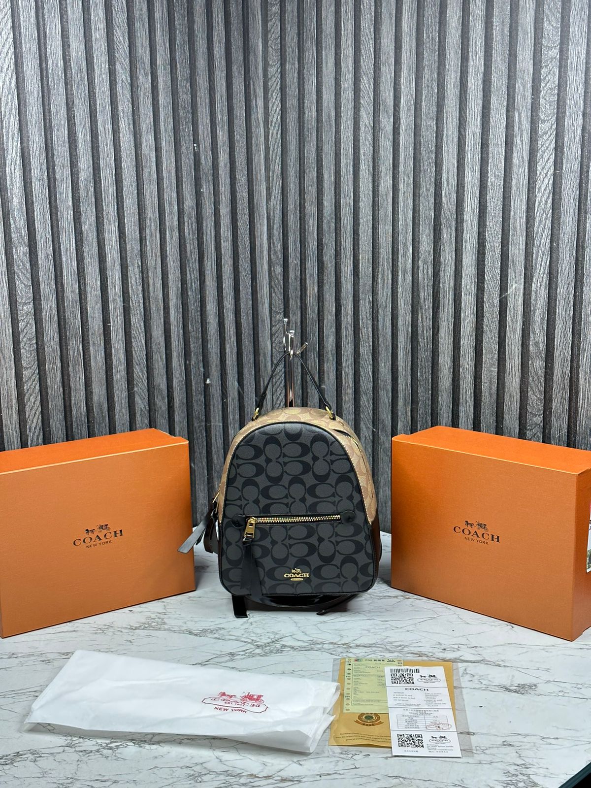 CCH PVC SIGNATURE BAGPACK WITH BOX