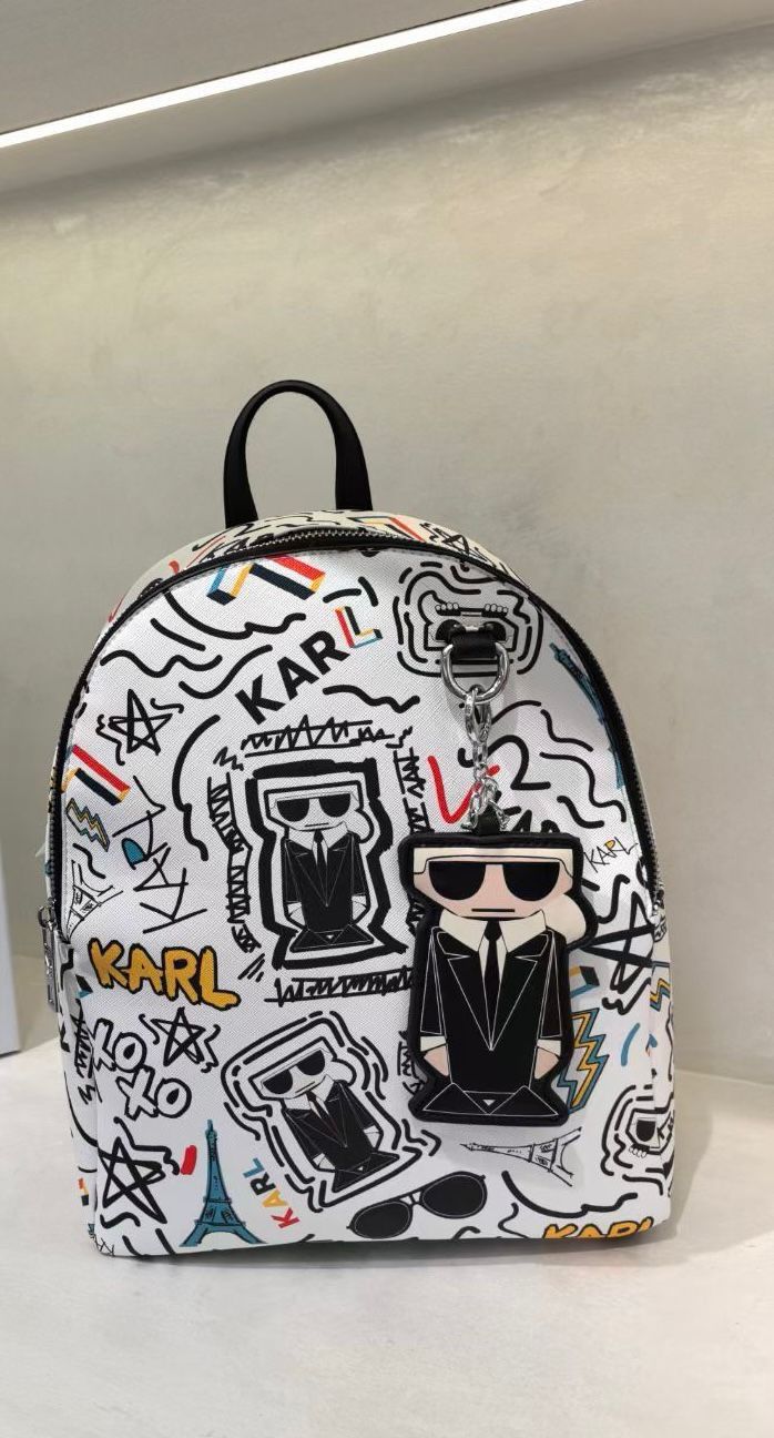 KAL PRINTED TASSLE BACKPACK WITH DUST Women Bag